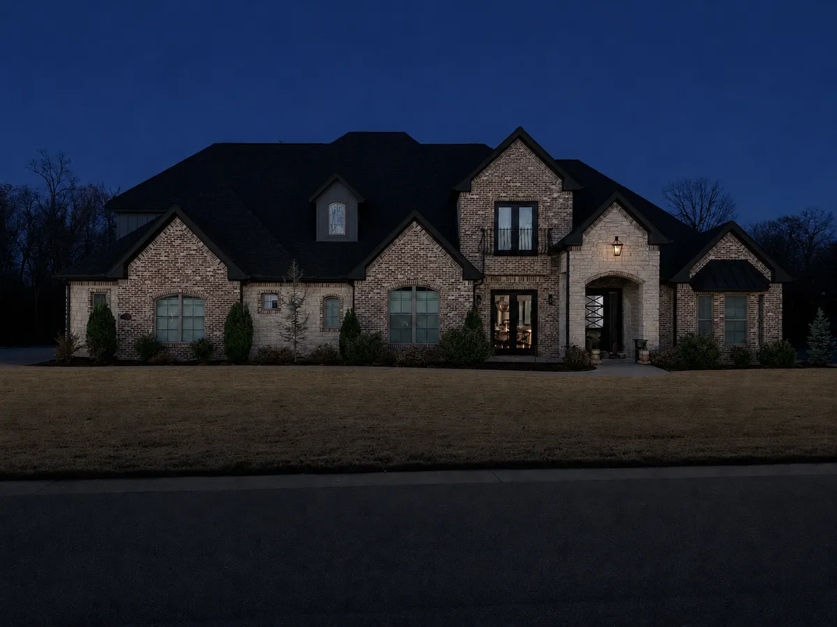 The same home at dusk before any lighting was installed